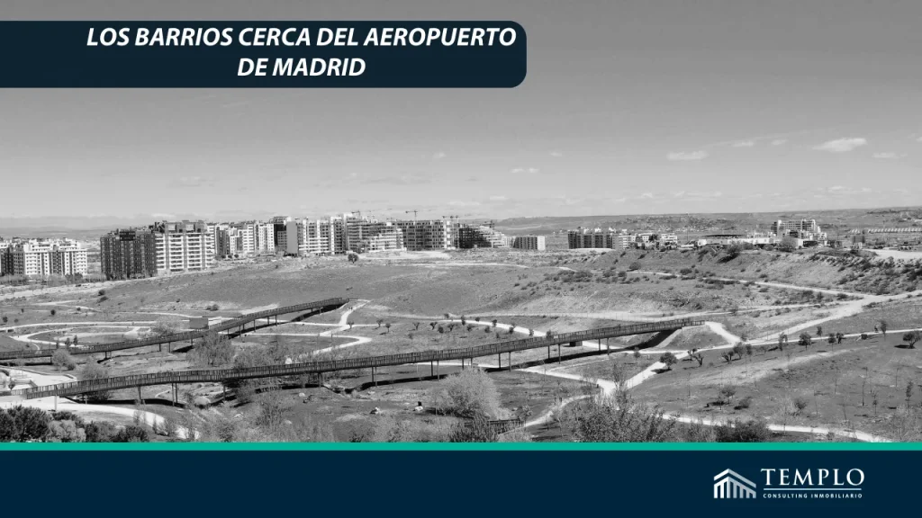 Imagen aérea de los barrios cercanos al aeropuerto de Madrid, mostrando una combinación de áreas residenciales, comerciales e industriales con conexiones viales bien establecidas y un entorno urbano activo.