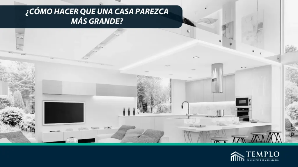 Una fotografía de una habitación bien iluminada con muebles minimalistas y colores claros que maximizan el espacio visual.