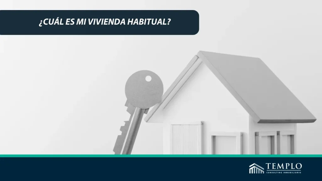 Imagen de una casa con una llave al costado.