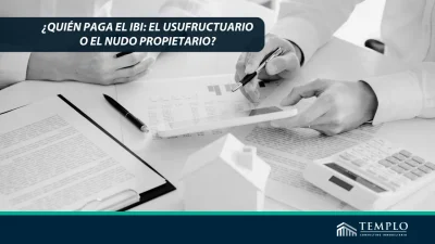 Explora quién asume la responsabilidad del Impuesto sobre Bienes Inmuebles (IBI) entre el usufructuario y el nudo propietario en el marco de un usufructo.